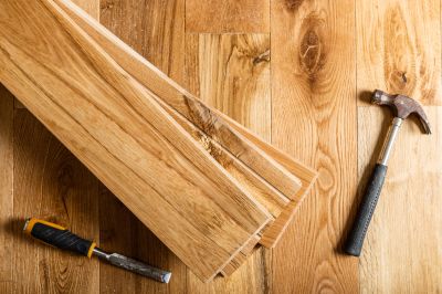 Prevent Bigger Problems Down the Road with Buckling Wood Floor Repair!