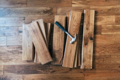 Assess the Damage and Determine How to Repair the Buckled Wood Floor!